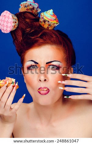 Fashion Beauty . Manicure and Make-up. Nail Art. Beautiful Woman With Colorful Nails and Luxury Makeup. Beautiful Girl Face and Hand