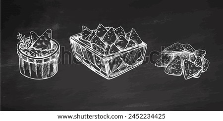 Hand-drawn sketch of nachos in a glass bowl, bowl with guacamole, nachos and parsley leaves with a handful of nachos. Vintage drawing on chalkboard background. Mexican food. 