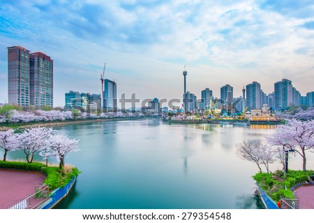 Korea cityscape with Lotte world and Cherry Blossom Festival in Spring,Seoul in South Korea