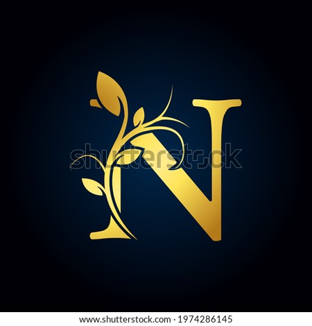 Elegant N Luxury Logo. Golden Floral Alphabet Logo with Flowers Leaves. Perfect for Fashion, Jewelry, Beauty Salon, Cosmetics, Spa, Boutique, Wedding, Letter Stamp, Hotel and Restaurant Logo. Foto stock © 