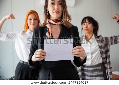 Similar – Image, Stock Photo girl power written in white on a black piece of paper
