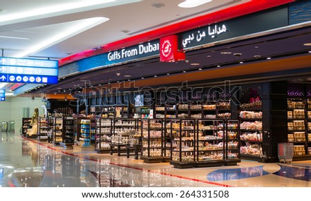 DUBAI, UAE - DEC 31: Glorious duty free shopping area in Dubai International Airport on Dec 31, 2014. Dubai International is the world\'s busiest airport in terms of international passenger traffic.