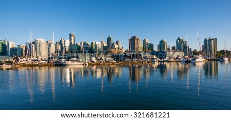 VANCOUVER, BC/CANADA - JULY 30: View of downtown Vancouver city from Stanley Park seawall on July 30, 2015 in Vancouver, Canada.