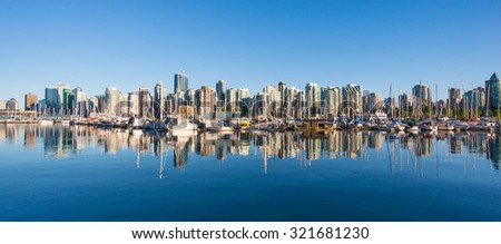 VANCOUVER, BC/CANADA - JULY 30: View of downtown Vancouver city from Stanley Park seawall on July 30, 2015 in Vancouver, Canada.
