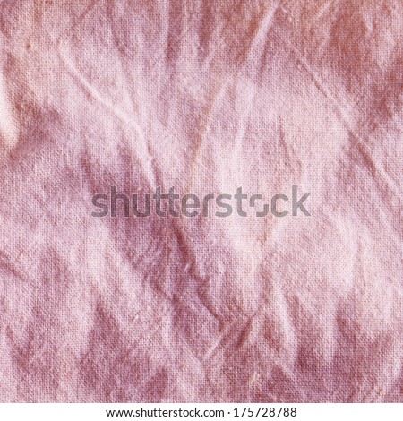 A light beige jute background, in strict close up
