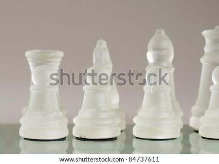 Front view of glass pieces of chess