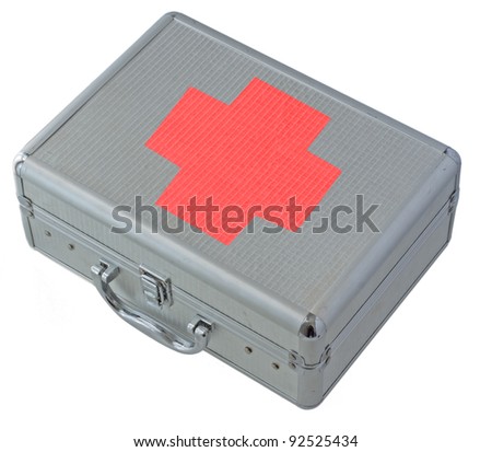 Little metal case with big red cross, isolated over white