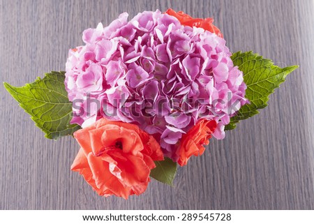 Geranium and roses seen from above, horizontal image