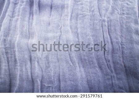 Gray tissue background, close up, horizontal image