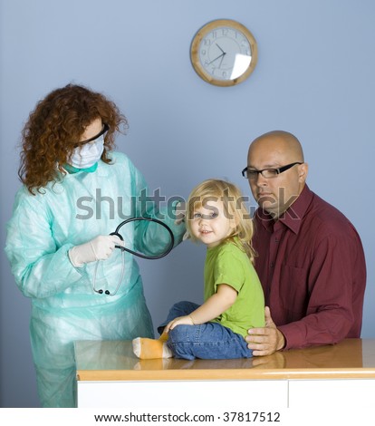 young girl and her father at doctor