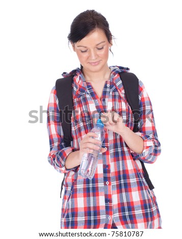 young student woman with a black backpack and water