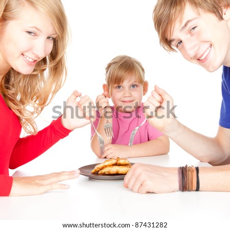 stock-photo-hungry-sisters-and-brother-keeping-forks-white-background-87431282.jpg