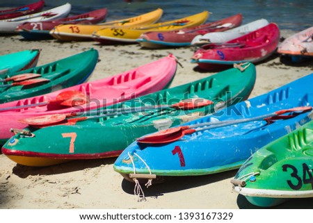 Similar – Image, Stock Photo Many canoes ready to go out