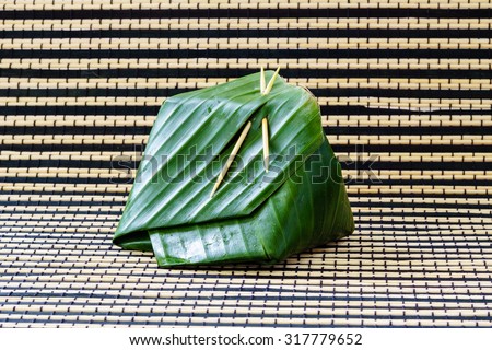 Packaging of banana leaves for sticky rice thai sweet dessert