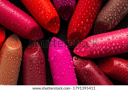 Similar – Image, Stock Photo Woman lipstick on pink background with copy space