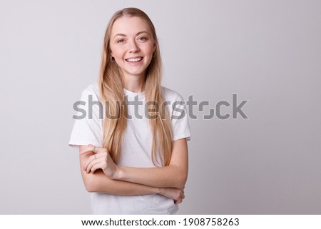 Similar – Image, Stock Photo blonde woman in front of a brick wall II