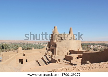 Qasr Marid is a castle in Dumat Al-Jandal - in the north of Saudi Arabia built before 272 CE. The castle was built by the very old city of Adumato. Stok fotoğraf © 