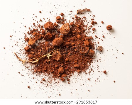 Red Soil isolated on White Background. Pile of Dirt and Stones. Top View of a Heap of Ground. Close Up Macro View