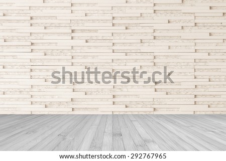Modern marble tile wall pattern  background in light cream beige color with wooden floor in grey tone : Horizontal marble rock stone tiled pattern texture detail backdrop with wood flooring