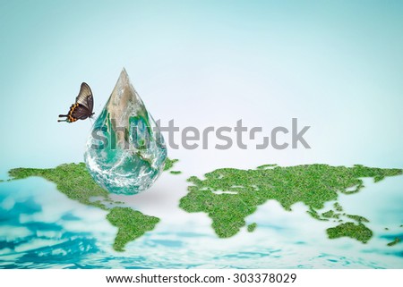 Butterfly drinking water from green globe droplet with world map/ ocean background : Save world environment and hydrography concept to combat desertification :Elements of this image furnished by NASA