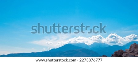 Similar – Image, Stock Photo Sunset sky over mountain ridge