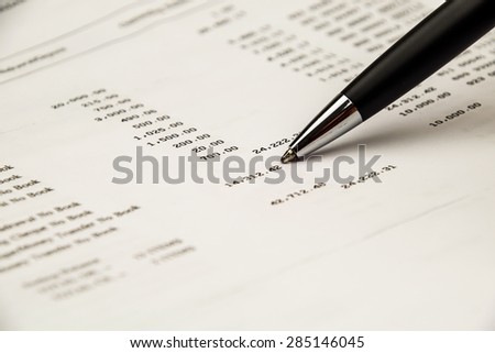 Pen point on Bank statement