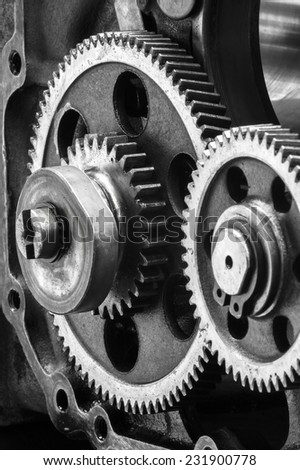 Large gears in the engine.black and white