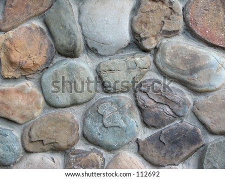 A close up view of a stone wall