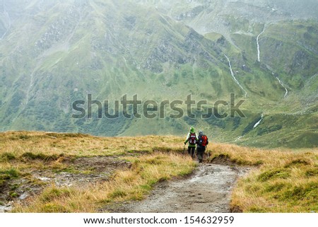 Group of man hiking in the Hohe Tauern mountains in Austria