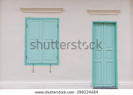 Locked green window and door