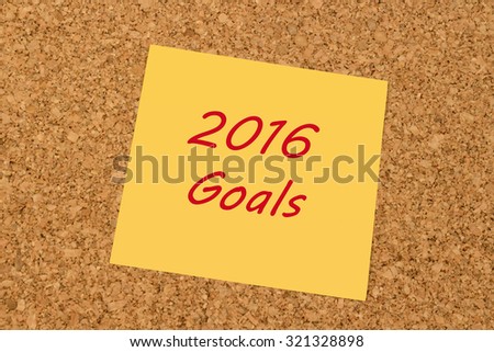 Yellow sticky note on an office cork board - New Year 2016 Goals