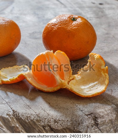 orange fruit still life image on wood