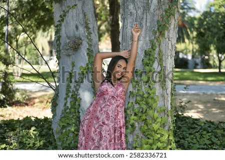 Image, Stock Photo Ivy vines enjoy the sun on a wooden board wall.