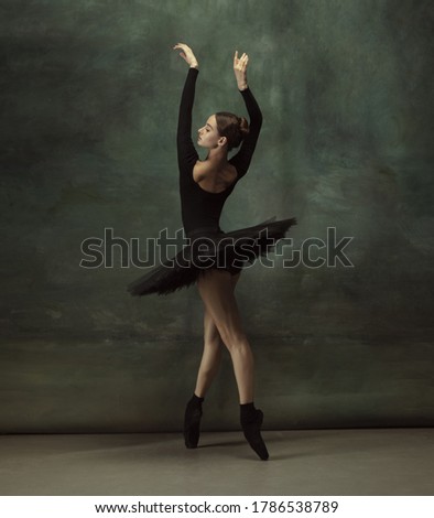 Image, Stock Photo Graceful woman dancing in dark park