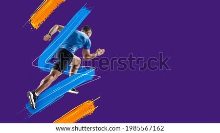 Red, blue and yellow lines, stripes. Sportive athletic man, runner training isolated in neon light on blue background. Art collage. Watercolor paints. Concept of sport, game, action. Copy space for ad Foto stock © 