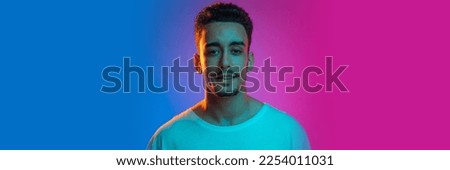 Similar – Image, Stock Photo Young man in neon red illumination