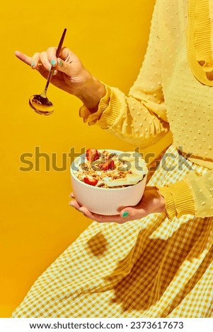 Similar – Image, Stock Photo Granola on a golden plate with a wooden spoon, rustic background