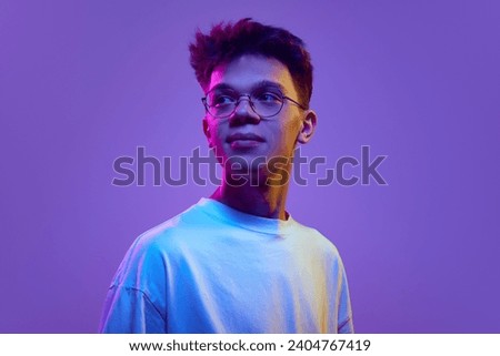 Similar – Image, Stock Photo Young man with modern haircut in urban background