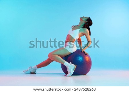 Similar – Image, Stock Photo Sportive woman sitting on sandy beach in asana