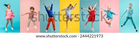 Similar – Image, Stock Photo Portrait of adorable boy in Santa Claus hat on blue studio background. Christmas