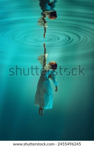 Similar – Image, Stock Photo Graceful woman dancing in dark park