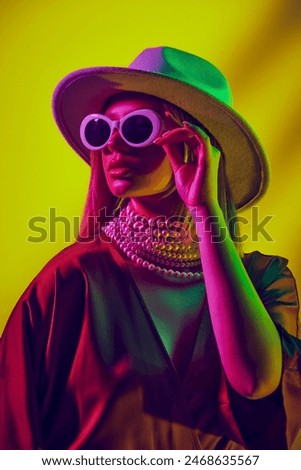 Similar – Image, Stock Photo Stylish woman in sunglasses leaning on building wall