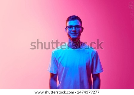 Similar – Image, Stock Photo Young man in neon red illumination