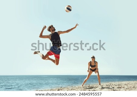 Image, Stock Photo Young man and ball stretching on basketball court outdoor