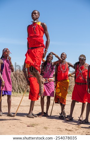 MASAI MARA,KENYA, AFRICA- FEB 12: Masai warriors dancing traditional jumps as cultural ceremony,review of daily life of local people,near to Masai Mara National Park Reserve, Feb 12, 2010,Kenya