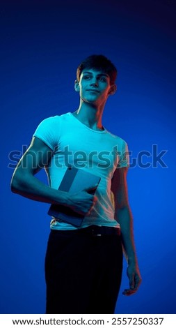 Similar – Image, Stock Photo Young man in neon red illumination