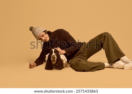 Similar – Image, Stock Photo Young guy and purebred dog embracing each other on street
