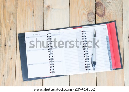 blank phone book on  wood background