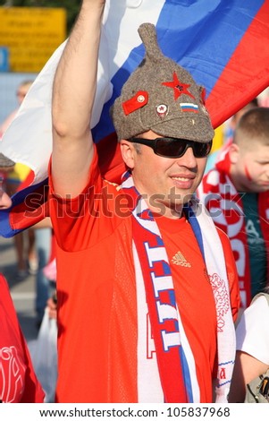 WARSAW, POLAND - JUNE 16: Russian football fan in a characteristic hat on June 16, 2012 in Warsaw, Poland.