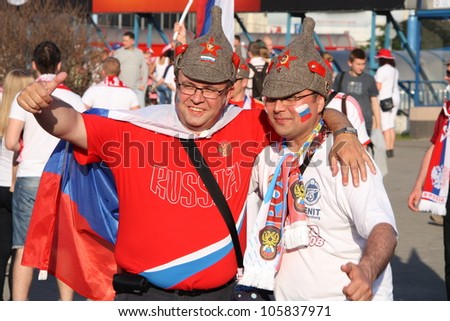 WARSAW, POLAND - JUNE 16: Russian fans celebrate Euro 2012 on the streets of Warsaw on June 16, 2012 in Warsaw, Poland.